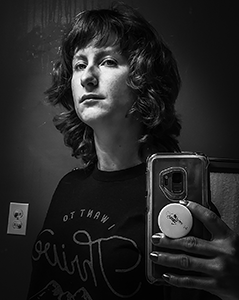Black and white bathroom selfie.